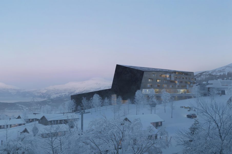 Modern apartment block on the mountainside with a view overlooking the valley and the mountains.