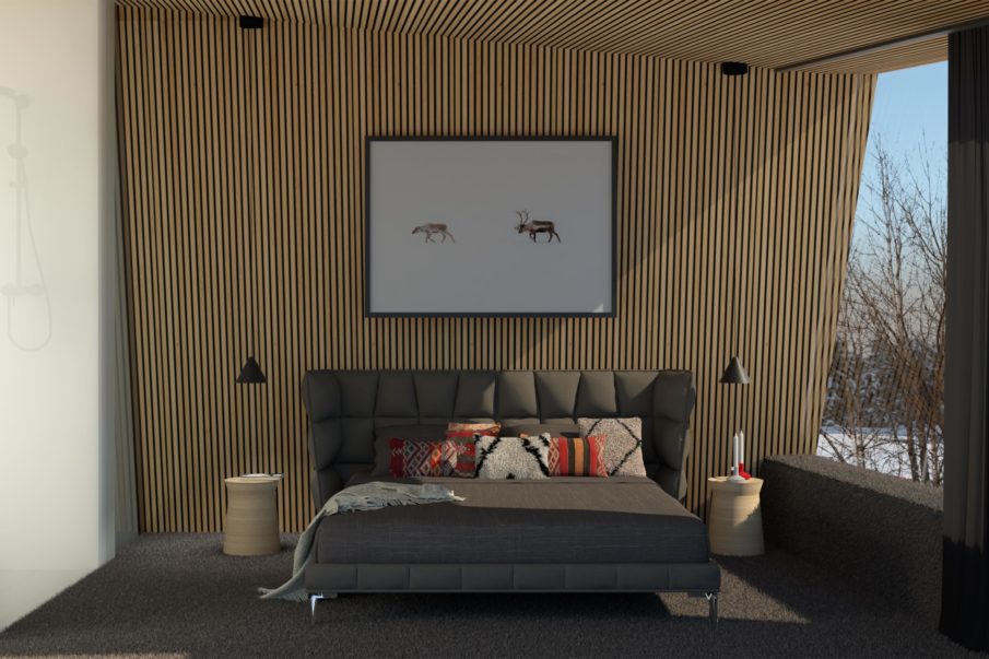 Bedroom with a double bed and a wall made of wooden slats behind the bed.